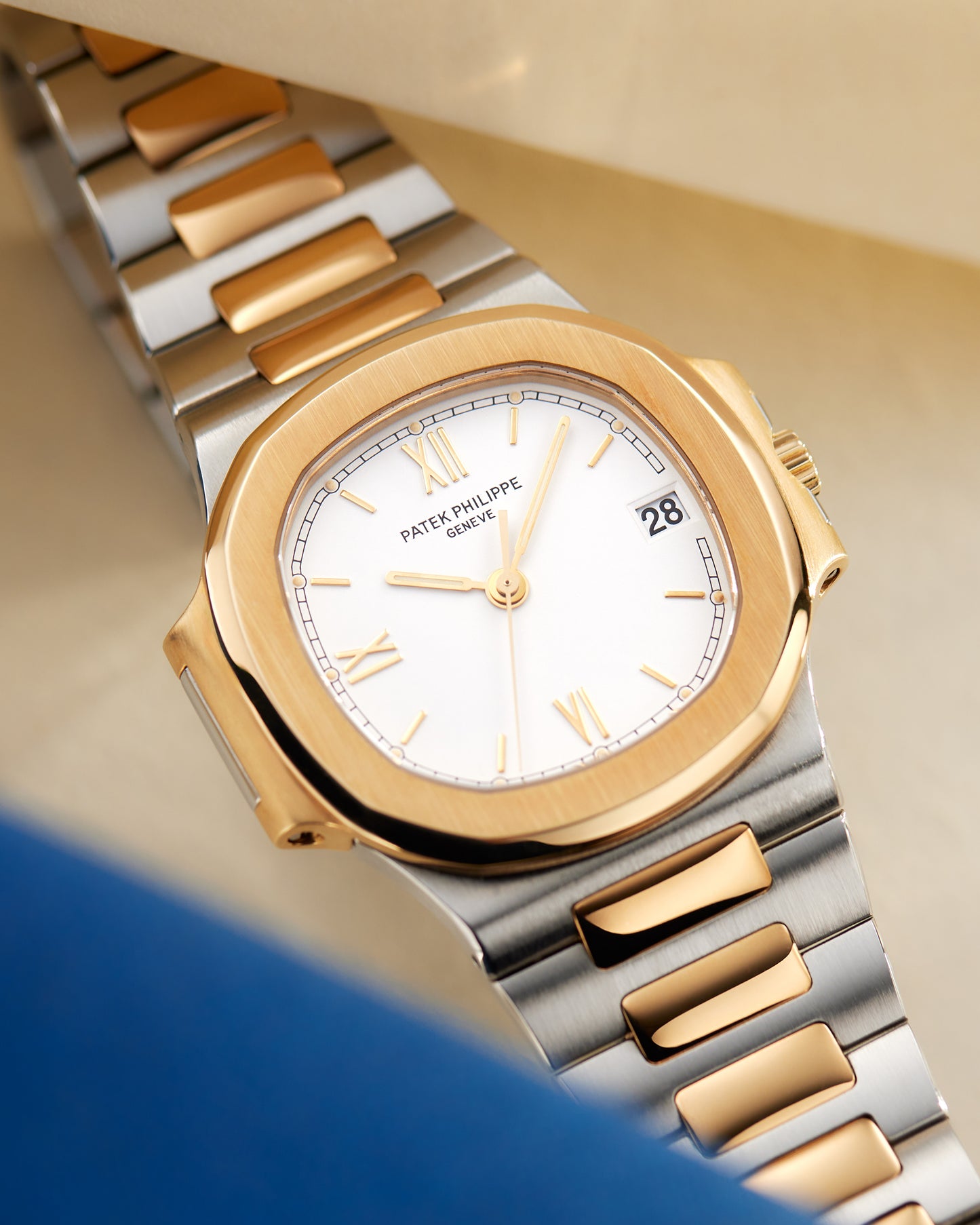 Patek Philippe Nautilus Yellow Gold & Steel White Dial