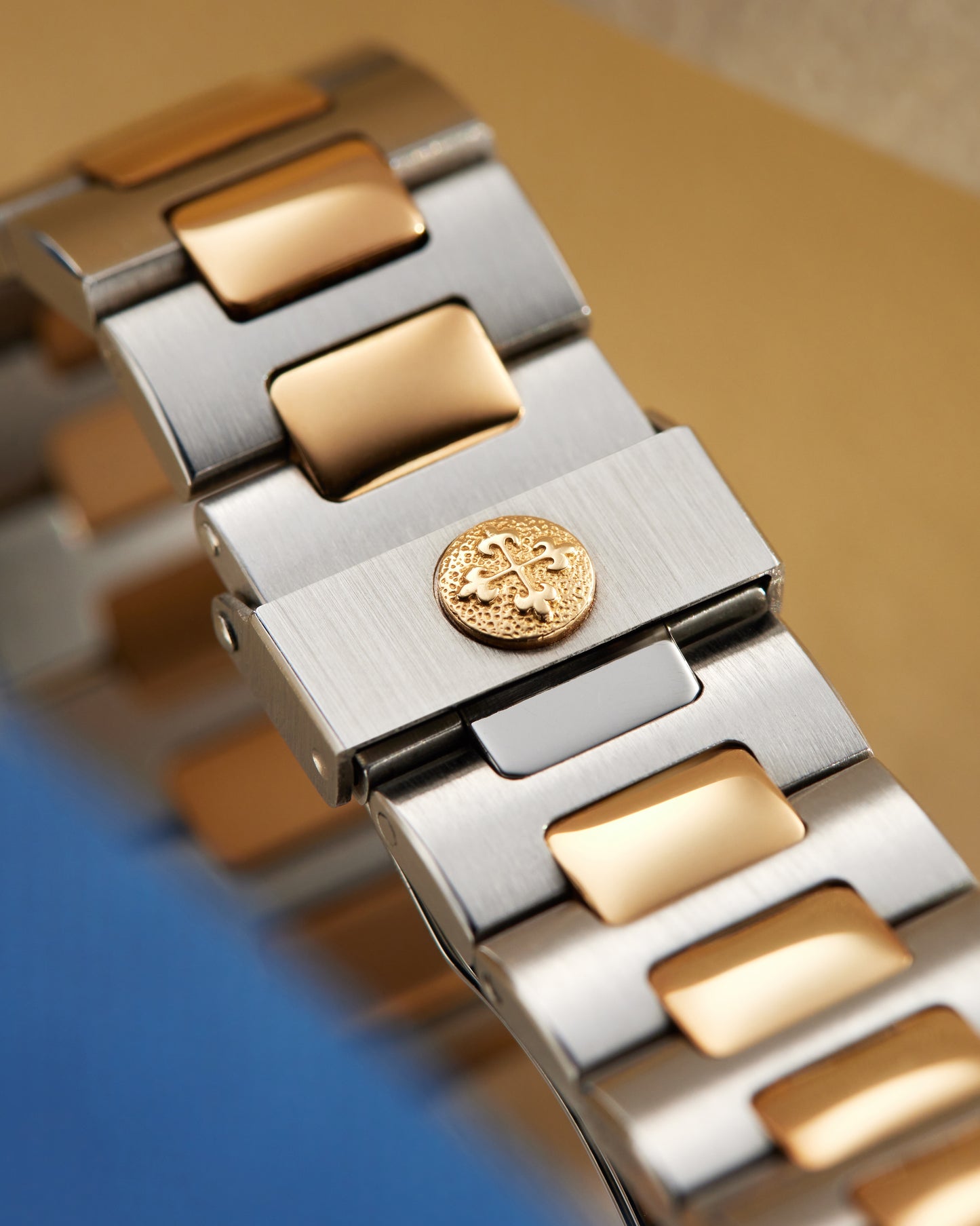 Patek Philippe Nautilus Yellow Gold & Steel White Dial