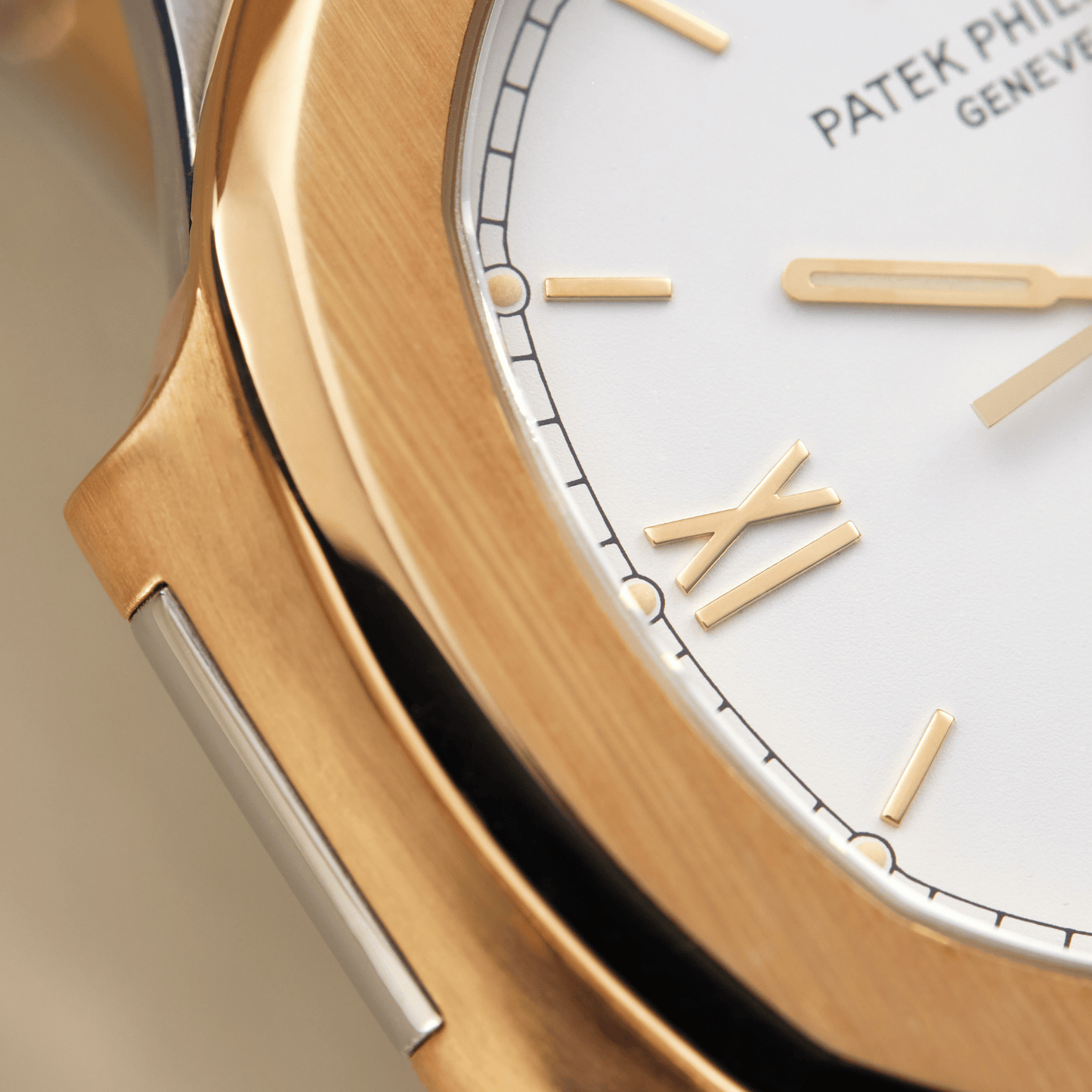 Patek Philippe Nautilus Yellow Gold & Steel White Dial