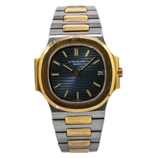 Patek Philippe Nautilus watch in gold and Black stainless steel