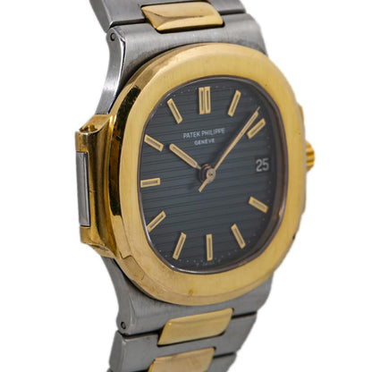 Patek Philippe Nautilus watch in gold and Black stainless steel